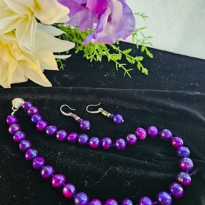18" necklace and earrings in 8mm purple cultured pearls, hand knotted with magnetic clasp.