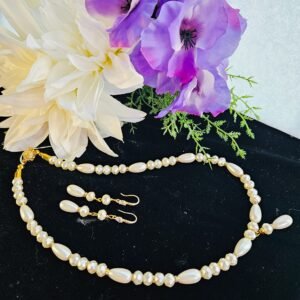 18" Glass pearls with gold tone magnetic clasp.