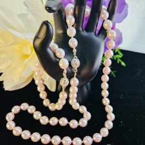 26" necklace, 7.75" bracelet, and earrings-hand knotted 8mm pale pink cultured pearls with magnetic clasp.