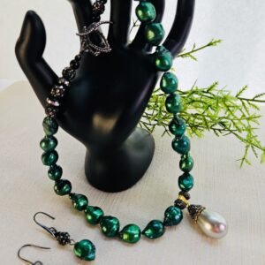 16" choker necklace and earrings in 8mm green potato pearls with pearl pendant.