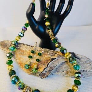 20" necklace and earrings in faceted and graduated Green Picasso Fire beads with gold tone accents.