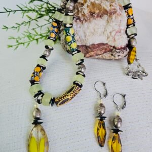 24" necklace and earrings with green glass from Ghana, Africa and silver tone accents.
