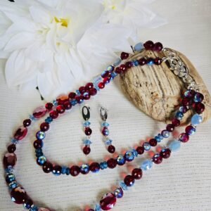 Double strand 20" and 16" necklace and earrings in dual color red and blue faceted glass with stainless steel accents.