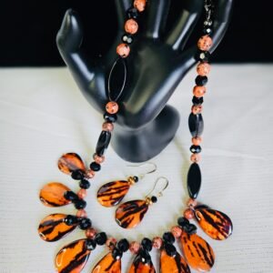 18" necklace and earrings with Jasper, glass and resin beads in orange and black tiger stripes.
