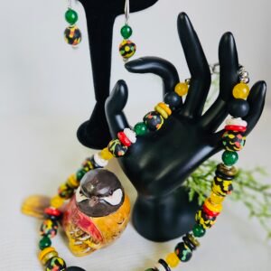 18" multi-colored necklace and earrings in glass beads from Ghana, Africa. Stainless steel accents.